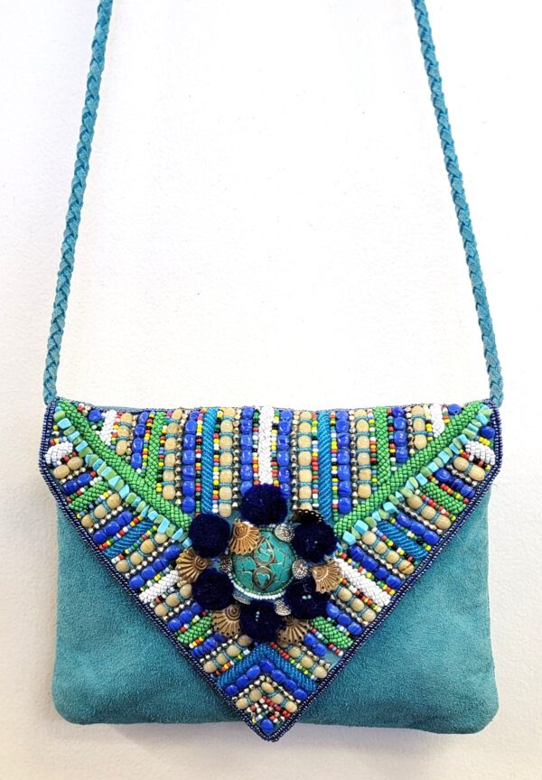LEATHER SUEDE BOHEMIAN POM POM CLUTCH
