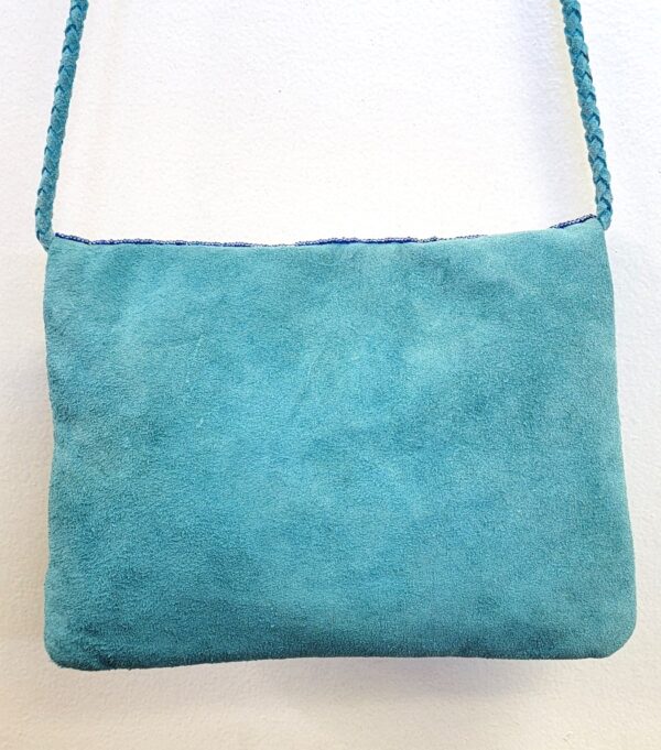 LEATHER SUEDE BOHEMIAN POM POM CLUTCH
