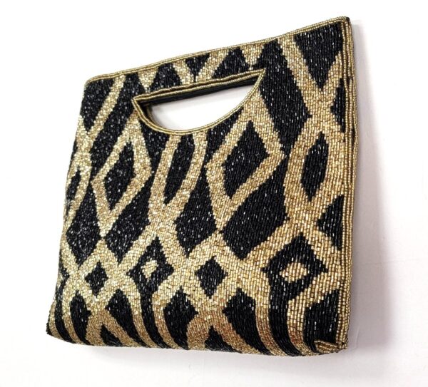 BEADED CUT HANDLE CLUTCH